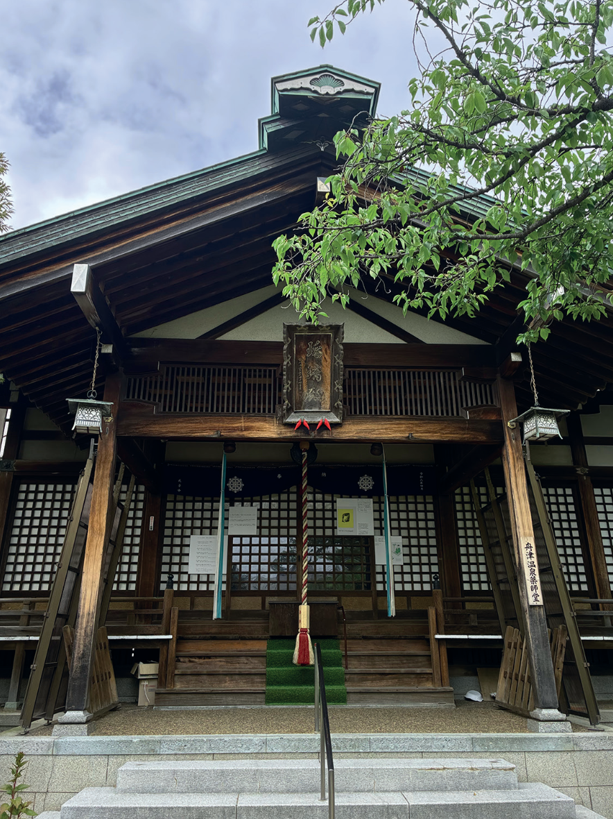 Yakushi-do hall with Elephant Tale prints installed at the entrance